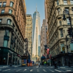 A street lined with skyscraper buildings.