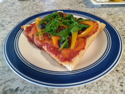 A slice of veggie pizza
